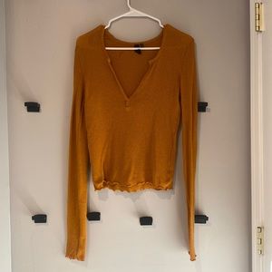 Thin sweater with v neck from Urban outfitters. Super soft and cute for fall